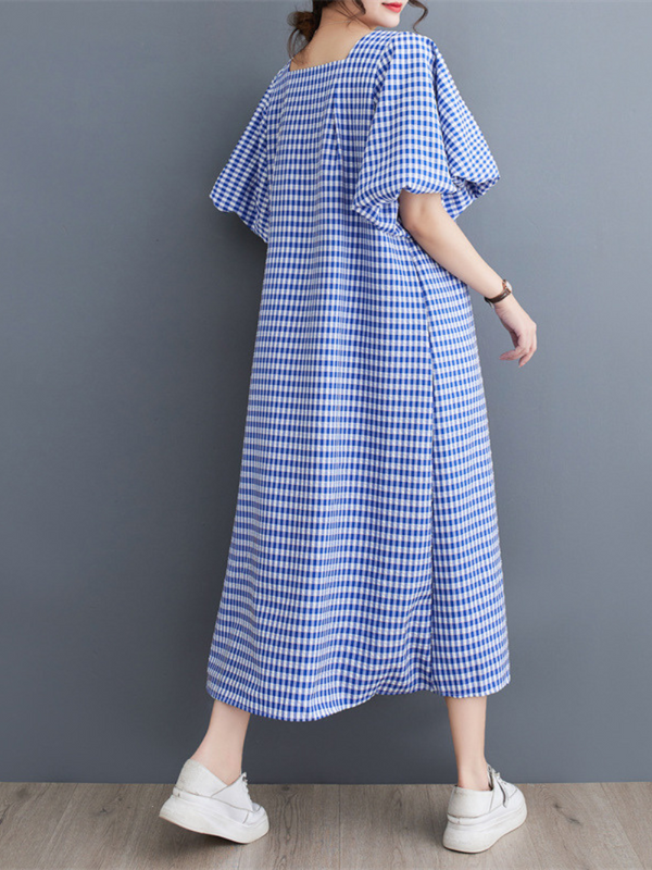 La délicieuse robe en ligne à carreaux carrés de femmes