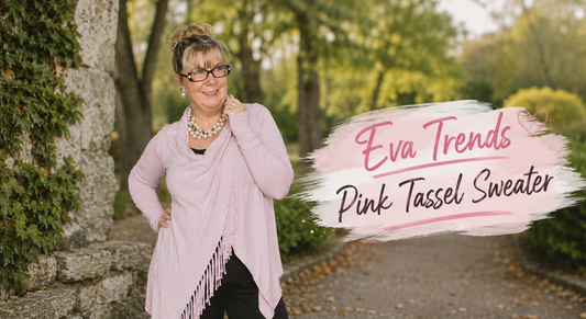 Woman wearing a pink tassel sweater styled with casual bottoms and boots for a cozy and fashionable fall outfit.