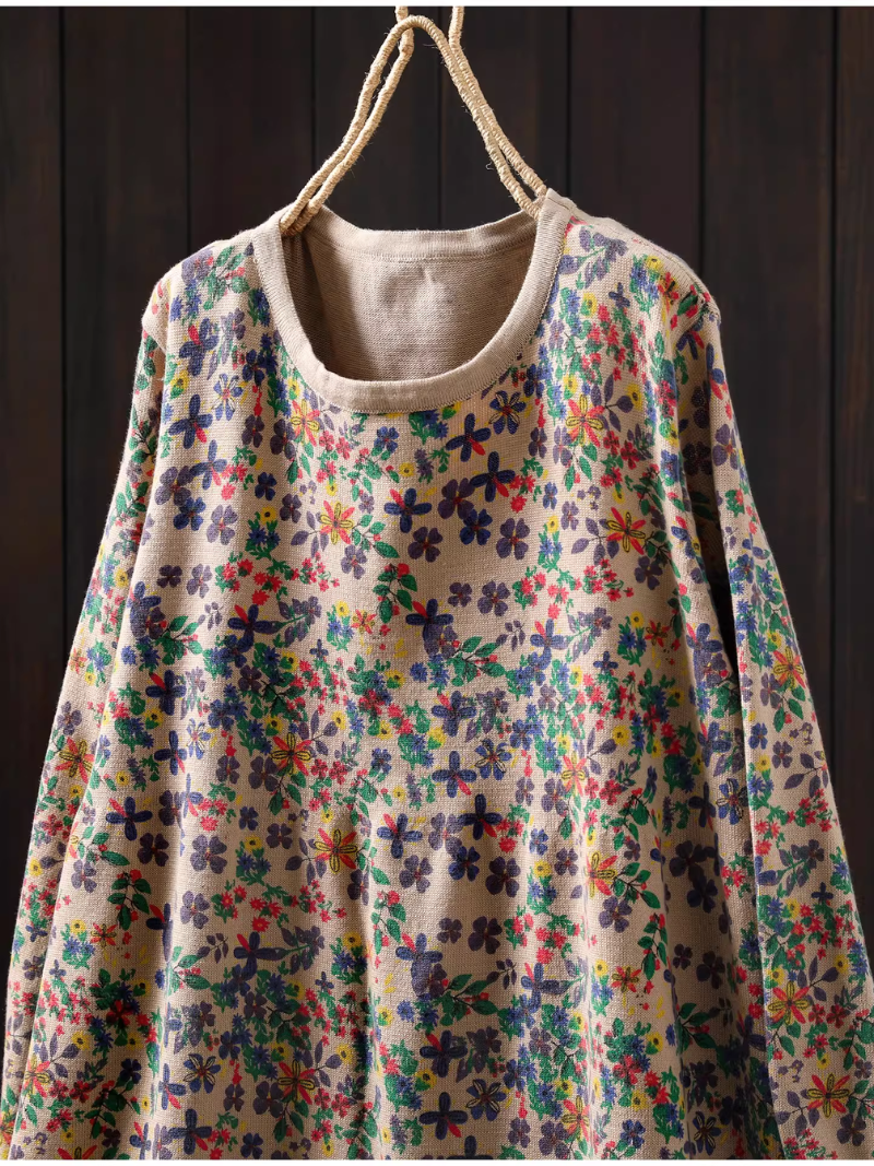 Elegant floral sweater dress in relaxed A-line silhouette for winter