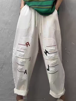 Chic Cotton Drawstring Tapered Pants with Artful Slashes for Women