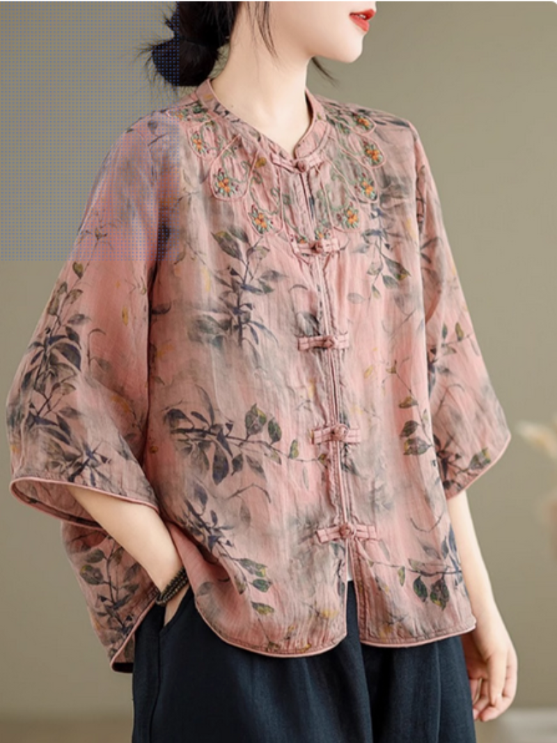  Women's top exudes a chic and feminine appeal