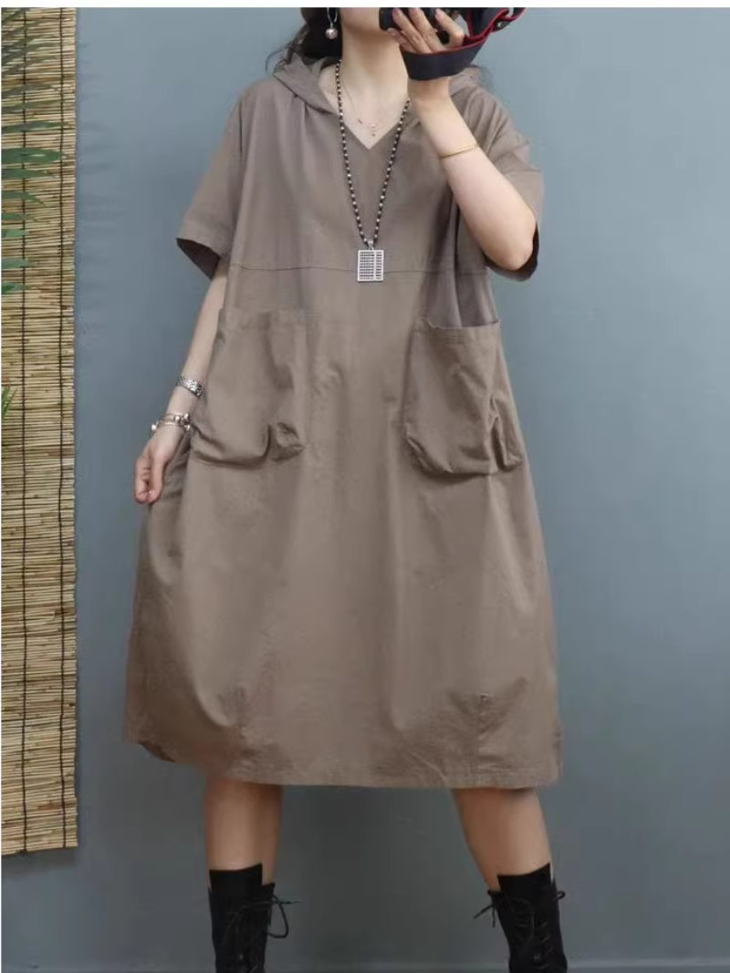Mulher todos os dias usam camisa de capuz de bolso grande e de comprimento médio casual