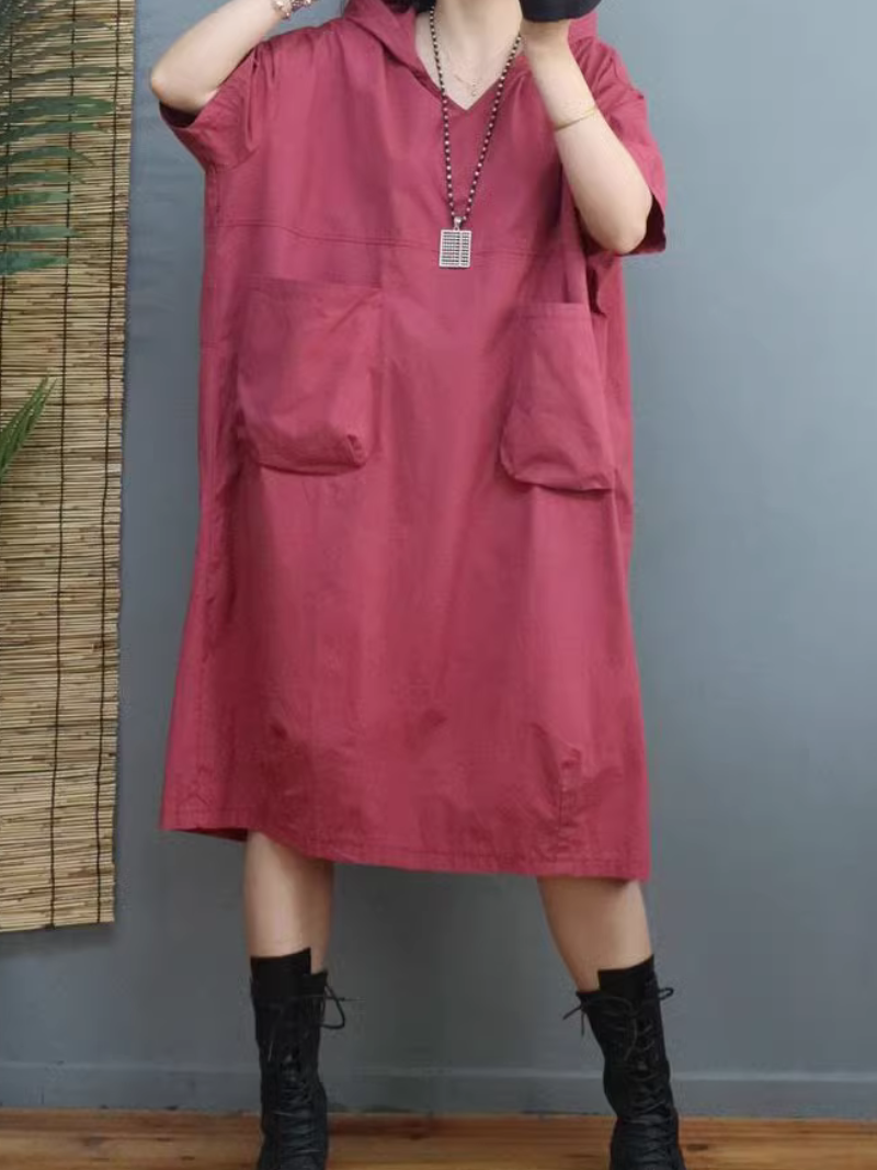 Mulher todos os dias usam camisa de capuz de bolso grande e de comprimento médio casual
