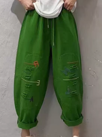 Chic Cotton Drawstring Tapered Pants with Artful Slashes for Women