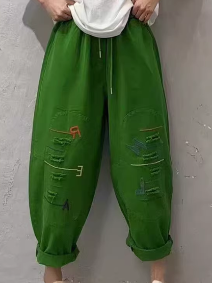 Chic Cotton Drawstring Tapered Pants with Artful Slashes for Women