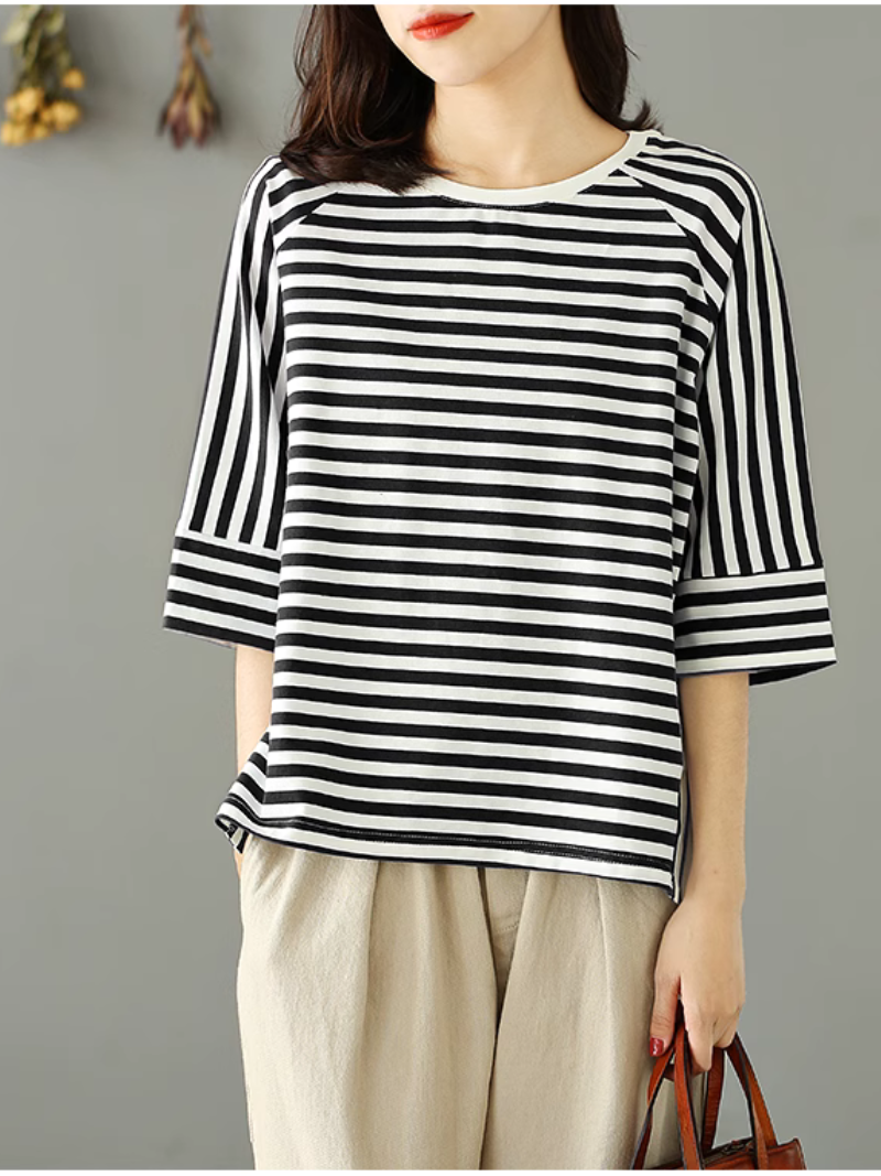 relaxing at home, this top is your go-to for casual style.