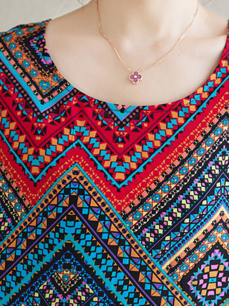 La plage d'été pour femmes porte une robe de kaftan imprimée bohème lâche