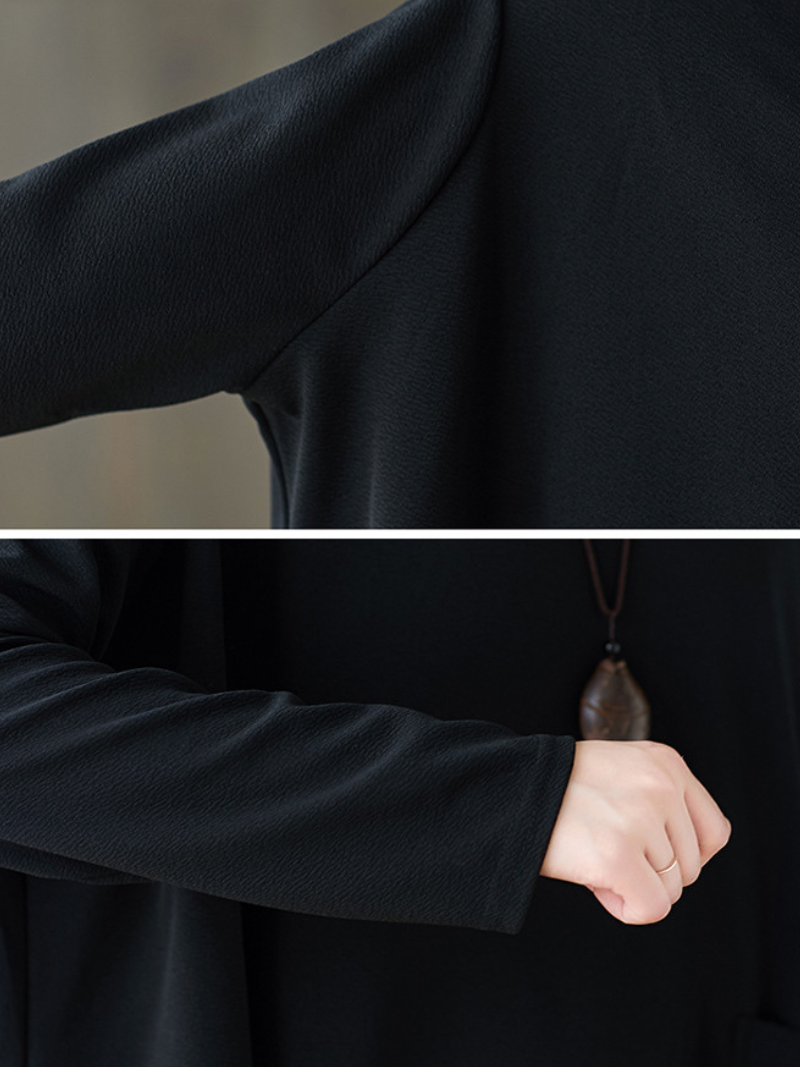 Asymmetrical Oversized Tunic Top with Sculpted Pockets in Black Polyester