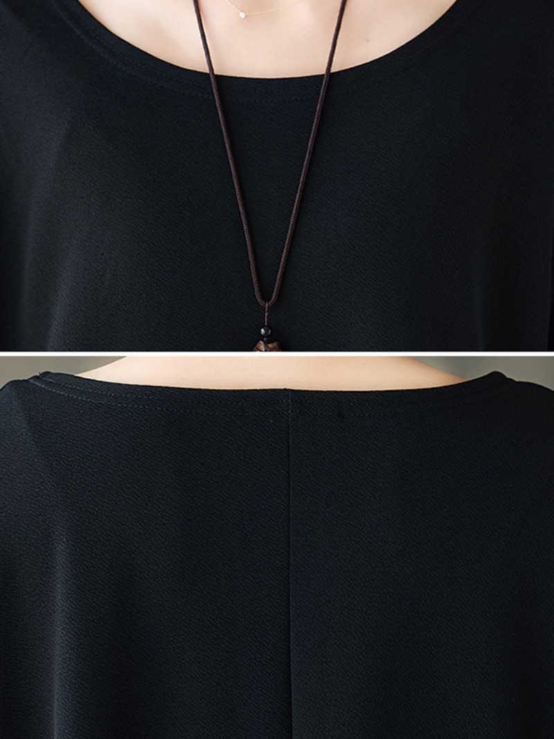 Asymmetrical Oversized Tunic Top with Sculpted Pockets in Black Polyester