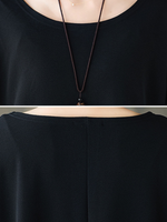 Asymmetrical Oversized Tunic Top with Sculpted Pockets in Black Polyester