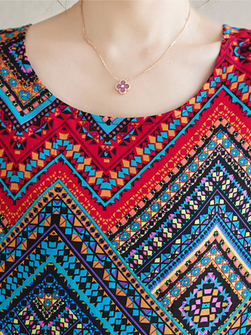 La plage d'été pour femmes porte une robe de kaftan imprimée bohème lâche