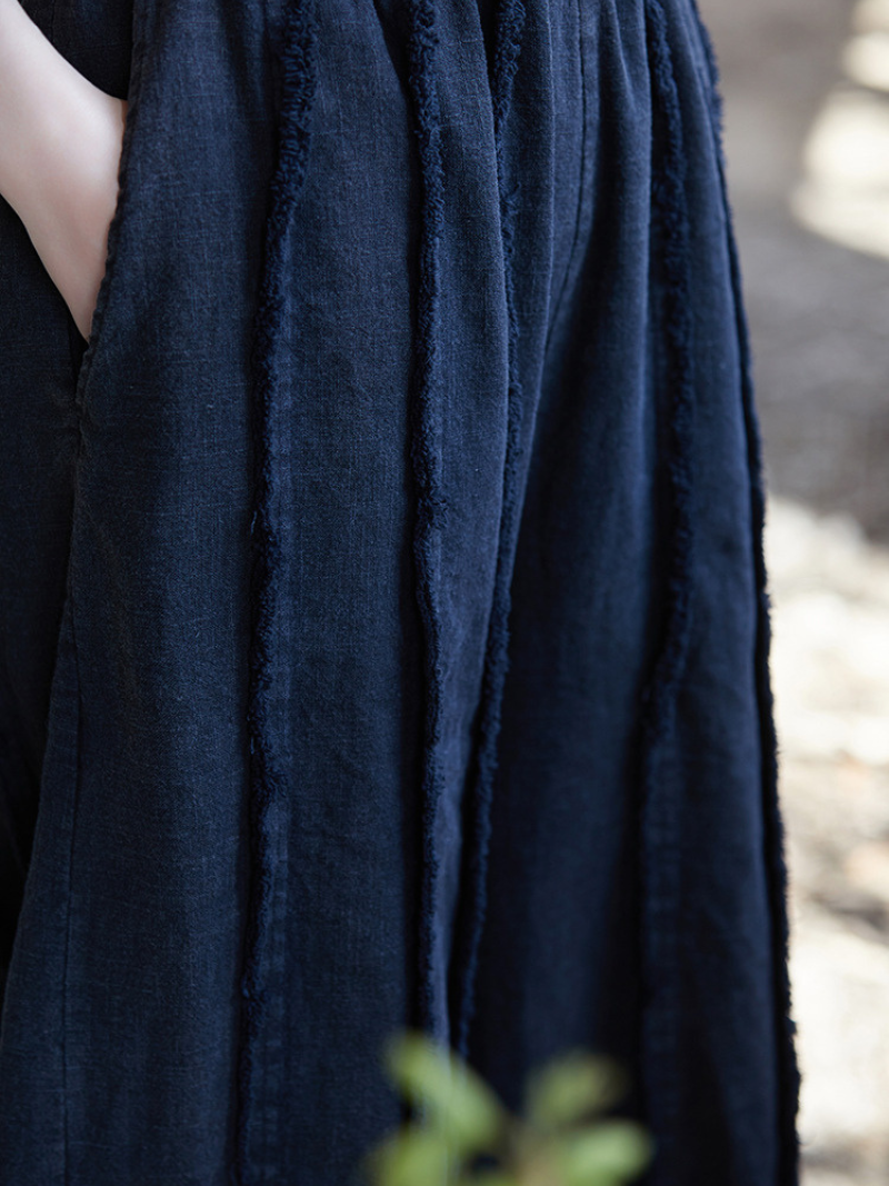 Navy blue fabric with a textured surface