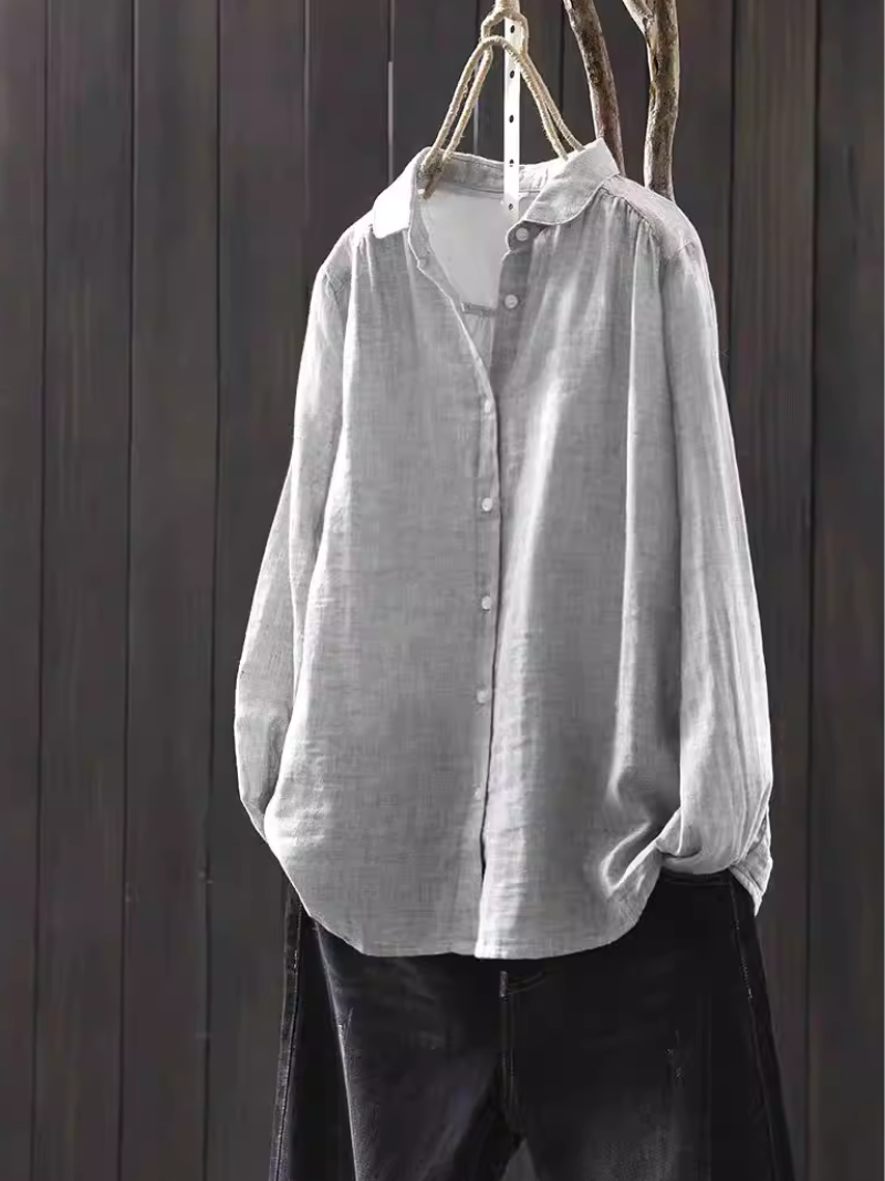 Minimalist cotton-linen button-down blouse with relaxed silhouette for elevated everyday style