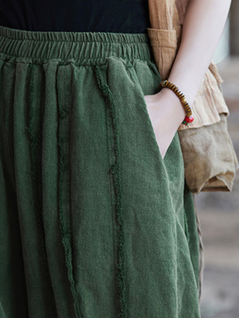 Women's  wearing a green skirt 