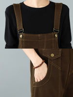 dark brown overalls with denim