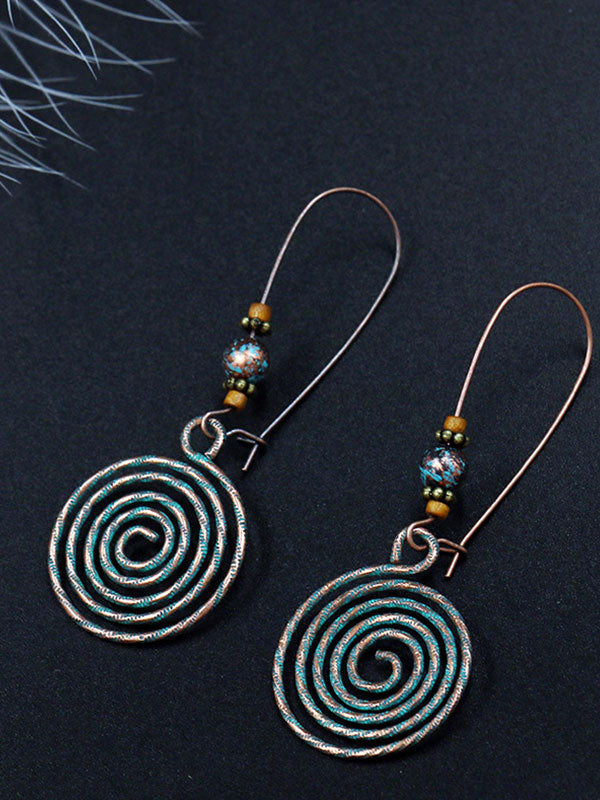 Boucles d'oreilles traits vivants