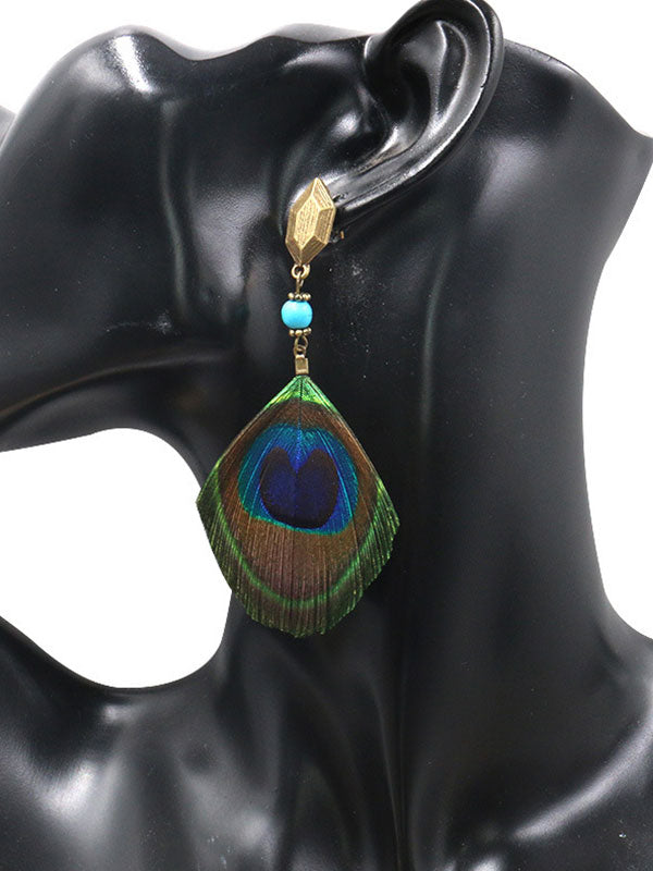 Boucles d'oreilles de plumes de paon d'addition immaculées