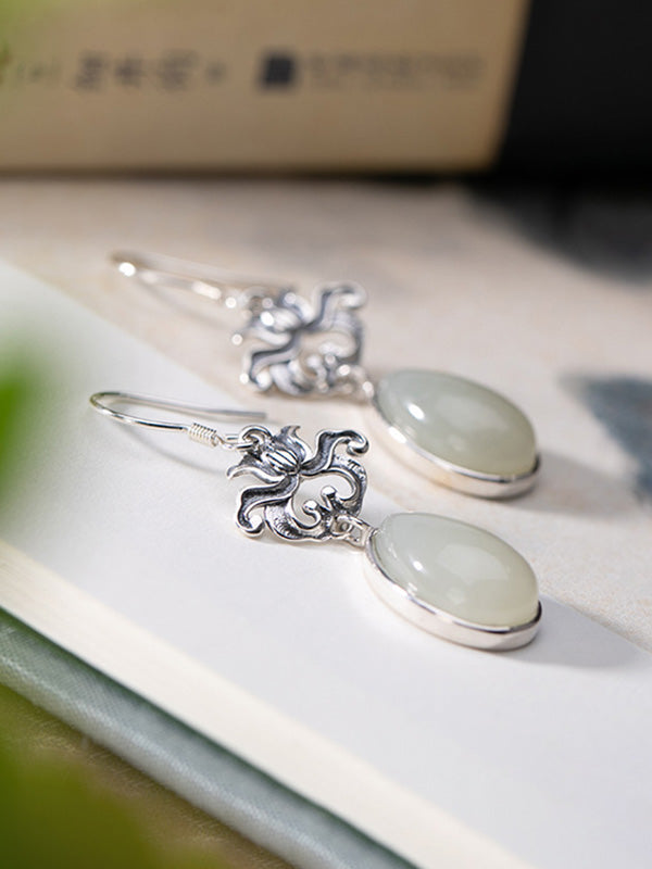 Les boucles d'oreilles tactile finissantes