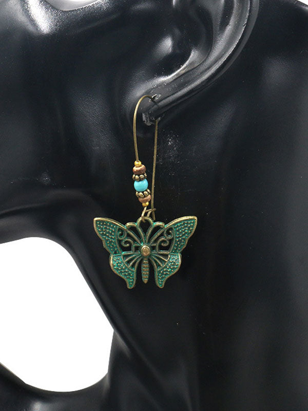 Chantent des boucles d'oreilles papillon des ailes