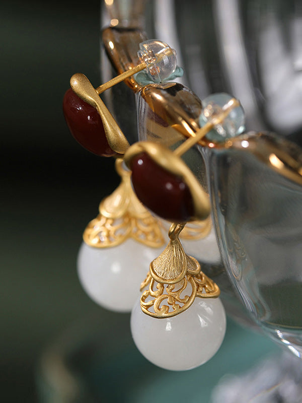 Les boucles d'oreilles de seconde ou non