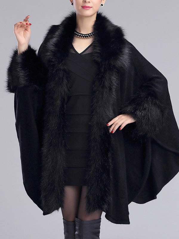 Cashmere cape over elegant dress
