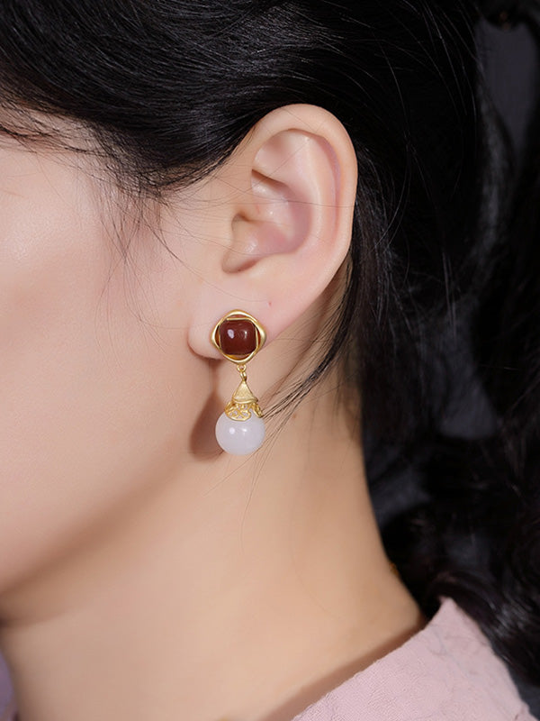 Les boucles d'oreilles de seconde ou non