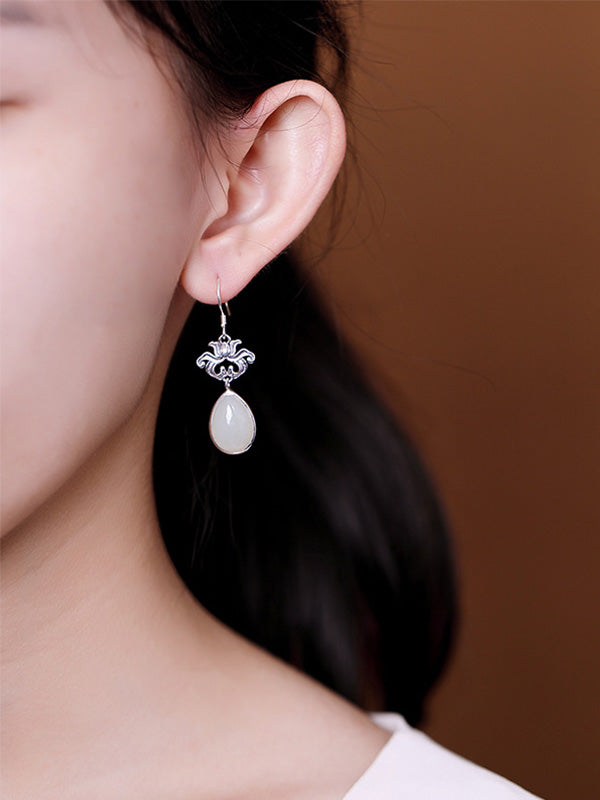 Les boucles d'oreilles tactile finissantes